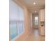 Bright hallway with tile flooring and large windows at 573 Lago Matisse St, Kissimmee, FL 34759
