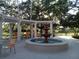 Peaceful pool area with fountain and comfortable seating at 573 Lago Matisse St, Kissimmee, FL 34759