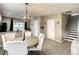 Dining area with round table and chairs near kitchen and stairs at 1030 Bending Oak Trl, Winter Garden, FL 34787