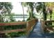 Wooden dock extending over the lake, offering scenic views at 105 Northlake Dr # 105, Sanford, FL 32773