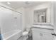 Clean bathroom with white vanity and a shower/tub combo at 1567 Candlefire Row, Kissimmee, FL 34744