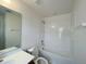 Bathroom with single vanity, toilet and shower/tub combo at 2553 Shanti Dr, Kissimmee, FL 34746