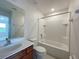 Bathroom with single vanity, toilet and shower/tub combo at 2553 Shanti Dr, Kissimmee, FL 34746