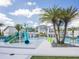 Resort-style pool with water features and lounge chairs at 2553 Shanti Dr, Kissimmee, FL 34746
