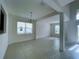 Bright dining room with tile floors and chandelier at 2553 Shanti Dr, Kissimmee, FL 34746