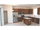 Modern kitchen with stainless steel appliances and an island at 2553 Shanti Dr, Kissimmee, FL 34746