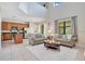 Open living room with high ceilings and access to the kitchen at 2553 Shanti Dr, Kissimmee, FL 34746