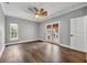 Spacious bedroom with hardwood floors and French doors leading to the patio at 333 N Spaulding Cv, Lake Mary, FL 32746