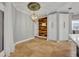 Charming breakfast nook with wood wall accent and white cabinets at 333 N Spaulding Cv, Lake Mary, FL 32746