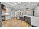 Spacious kitchen boasts a farmhouse sink, custom cabinetry, and high-end appliances at 333 N Spaulding Cv, Lake Mary, FL 32746