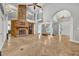 Two story living room with a large brick fireplace at 333 N Spaulding Cv, Lake Mary, FL 32746