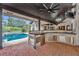 Outdoor kitchen with stainless steel appliances and granite countertops at 333 N Spaulding Cv, Lake Mary, FL 32746