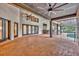 Spacious covered patio with brick flooring and access to the pool area at 333 N Spaulding Cv, Lake Mary, FL 32746
