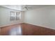 Bright bedroom with wood floors and ceiling fan at 8709 Rockingham Ter # A, Kissimmee, FL 34747