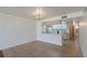 Kitchen features a breakfast bar, white cabinets, and appliances at 8709 Rockingham Ter # A, Kissimmee, FL 34747