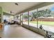 Spacious screened porch overlooking backyard at 1265 Gray Ct, Eustis, FL 32726