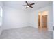 Spacious bedroom with ceiling fan and en-suite bathroom at 17406 Sw 38Th Avenue Rd, Ocala, FL 34473