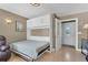 Bedroom with a Murphy bed and ample storage at 20106 Sunset Landing Ave, Groveland, FL 34736