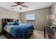 Spacious bedroom with a comfortable bed and plenty of storage at 20106 Sunset Landing Ave, Groveland, FL 34736