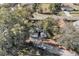 Aerial view of a single-Gathering home nestled among trees at 2080 Cobblefield Cir, Apopka, FL 32703