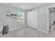 Well-lit bedroom with double-door closet at 2080 Cobblefield Cir, Apopka, FL 32703