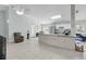 Open kitchen with island, stainless steel appliances, and granite countertops at 2080 Cobblefield Cir, Apopka, FL 32703