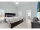 Large main bedroom with a king-size bed and ensuite bathroom at 2080 Cobblefield Cir, Apopka, FL 32703