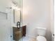 Clean bathroom with a glass shower and modern vanity at 2207 Homewood Dr, Belle Isle, FL 32809