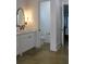Bathroom with toilet and single vanity with white cabinets at 2293 Eldorado Ct, St Cloud, FL 34771