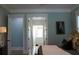 Bedroom with access to bathroom and light blue walls at 2293 Eldorado Ct, St Cloud, FL 34771