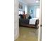 Spacious bedroom with wood bed frame and light blue walls at 2293 Eldorado Ct, St Cloud, FL 34771