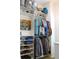 Spacious walk-in closet with ample shelving and hanging space at 2293 Eldorado Ct, St Cloud, FL 34771