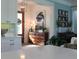 Bright entryway with wood floors and statement art at 2293 Eldorado Ct, St Cloud, FL 34771
