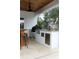 Outdoor kitchen with stainless steel appliances and granite countertops at 2293 Eldorado Ct, St Cloud, FL 34771