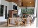 Spacious covered patio with seating area and fireplace at 2293 Eldorado Ct, St Cloud, FL 34771