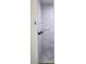 Walk-in shower with marble tile and dual shower heads at 2293 Eldorado Ct, St Cloud, FL 34771