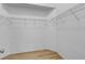 Walk-in closet with wire shelving at 2643 Alamosa Pl, Lake Mary, FL 32746