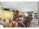 Living room with brown recliner and built-in entertainment center at 3007 Fayson Cir, Deltona, FL 32738