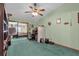 Home office with built-in shelving and view into main bedroom at 3007 Fayson Cir, Deltona, FL 32738