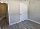 Bedroom with double door closet and access to upper level at 4263 Pinebark Ave # 3, Orlando, FL 32811