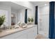 Bathroom boasts double vanity and shower at 463 Taylor Groves Dr, Lake Wales, FL 33853