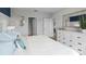 Main bedroom with white dresser and access to other rooms at 463 Taylor Groves Dr, Lake Wales, FL 33853