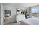 Main bedroom with white dresser and view of dining room at 463 Taylor Groves Dr, Lake Wales, FL 33853