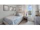 Bedroom with beach-themed decor and window view at 463 Taylor Groves Dr, Lake Wales, FL 33853