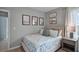 Bedroom with beach-themed decor and window view at 463 Taylor Groves Dr, Lake Wales, FL 33853