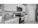 Well-equipped kitchen with stainless steel appliances and ample counter space at 463 Taylor Groves Dr, Lake Wales, FL 33853