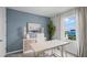 Home office with a desk, chairs, and coastal decor at 463 Taylor Groves Dr, Lake Wales, FL 33853