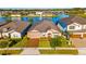 House on a lake with a fountain, showing neighborhood context at 5065 Hartwell Ct, Saint Cloud, FL 34771