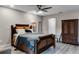 Comfortable bedroom with wood furniture and ceiling fan at 70 Sable Ct, Winter Springs, FL 32708