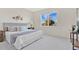 Bright bedroom featuring a comfortable king-size bed and ample natural light at 7836 June Ln, Wildwood, FL 34785